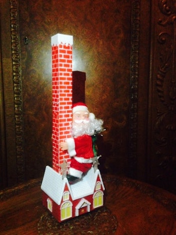 Kletternder UND singender Weihnachtsmann, 33cm hoch für nur 2,99 EUR + 4 EUR Versand